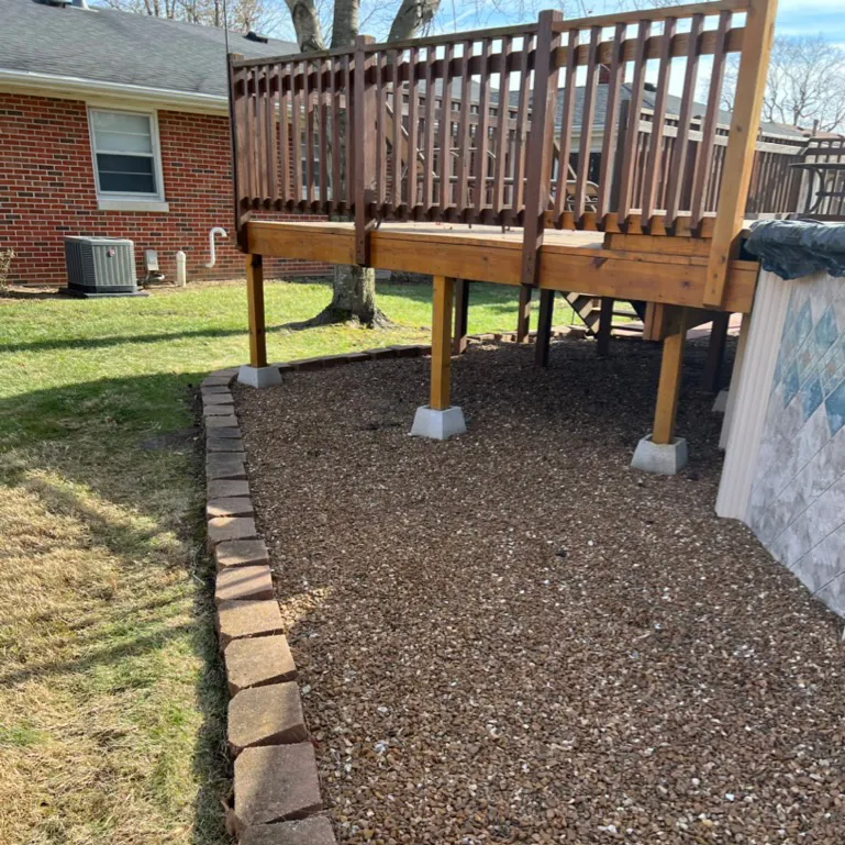 Freshly mulched yard under the porch