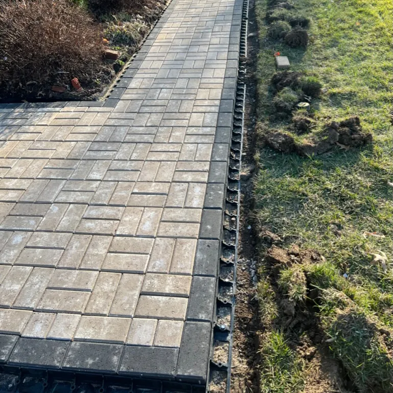 Dug up dirt to pave outdoor walkway